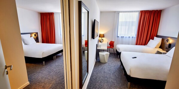 Standard Room, Multiple Beds | Premium bedding, individually furnished, desk, laptop workspace