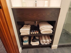 Shower, hair dryer, towels