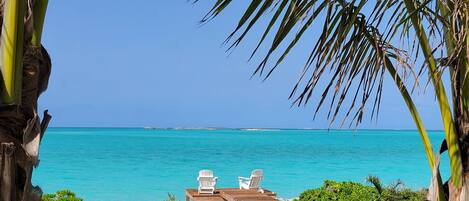 On the beach, sun-loungers, beach towels
