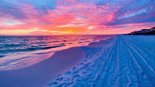 A beach with a clear sky and footprints in the sand. - Gulf view, Pool, Deed Beach Beach Access in Santa Rosa Beach.  (Santa Rosa Beach)