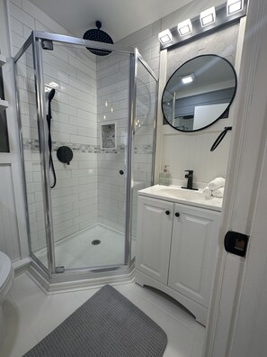 Hair dryer, towels, soap, shampoo