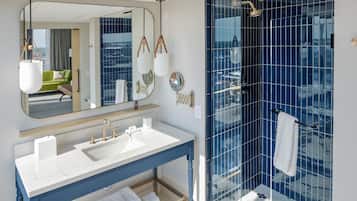 Shower, designer toiletries, hair dryer, bathrobes