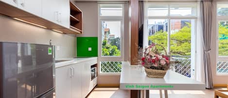 Business Studio, Balcony | Private kitchen