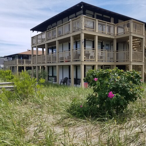 Kitchenette studio - water + woods + deck -  just STEPS from private BAY BEACH!