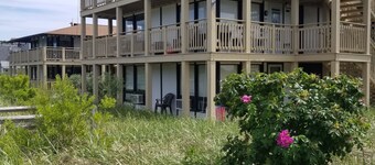 Kitchenette studio - water + woods + deck -  just STEPS from private BAY BEACH!