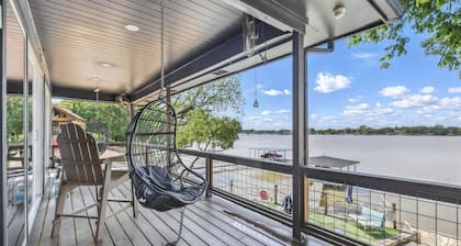 Waterfront Getaway on Lake Granbury! Pet Friendly, Lake Front with Boat House and Hot Tub!