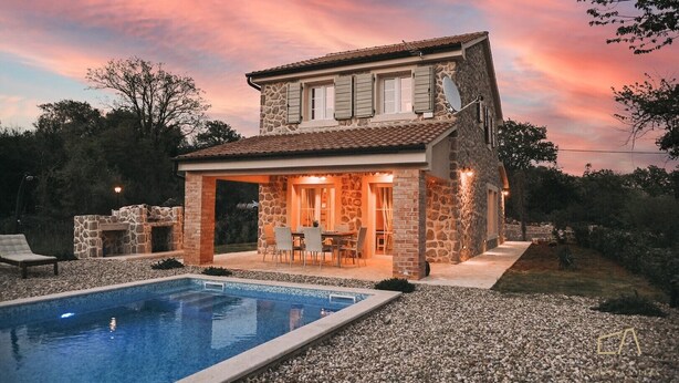 A two-story stone house with a swimming pool, outdoor seating, and a stone fireplace. - Charming stone house Villa Pepina (Risika)