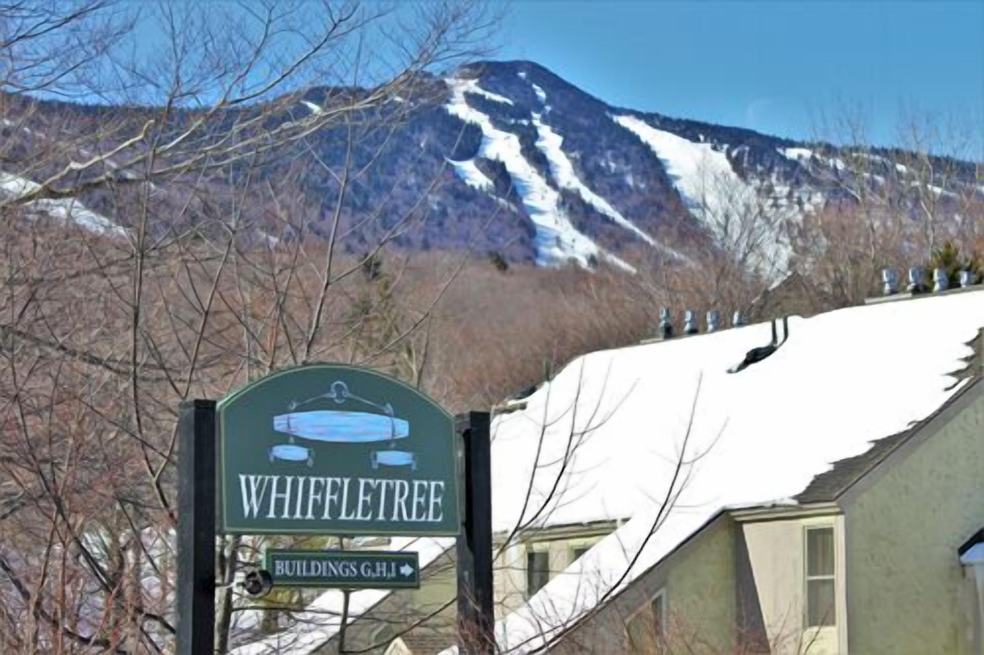 A sign for Whiffletree with a mountain in the background.