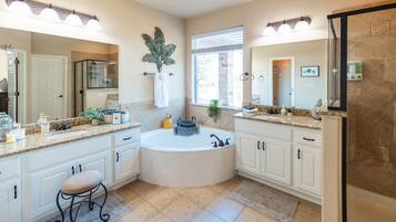Combined shower/bathtub, hair dryer, towels, soap