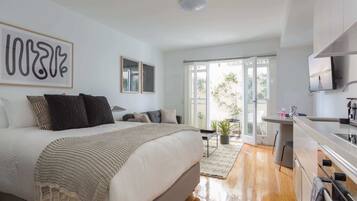 Desk, blackout curtains, iron/ironing board, WiFi