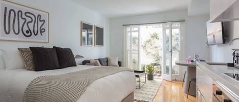 Desk, blackout drapes, iron/ironing board, WiFi