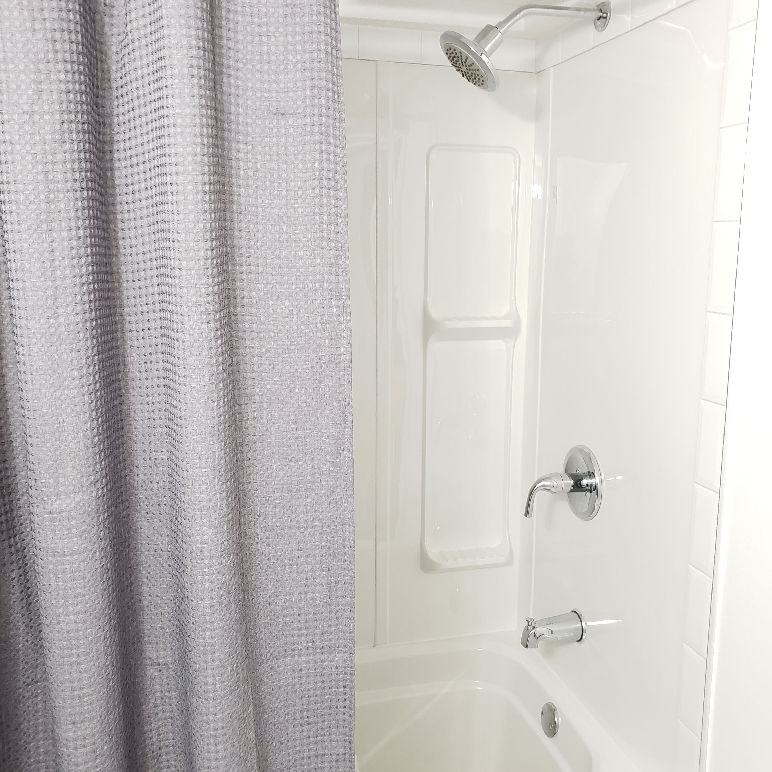 Combined shower/bathtub, hair dryer, towels, soap