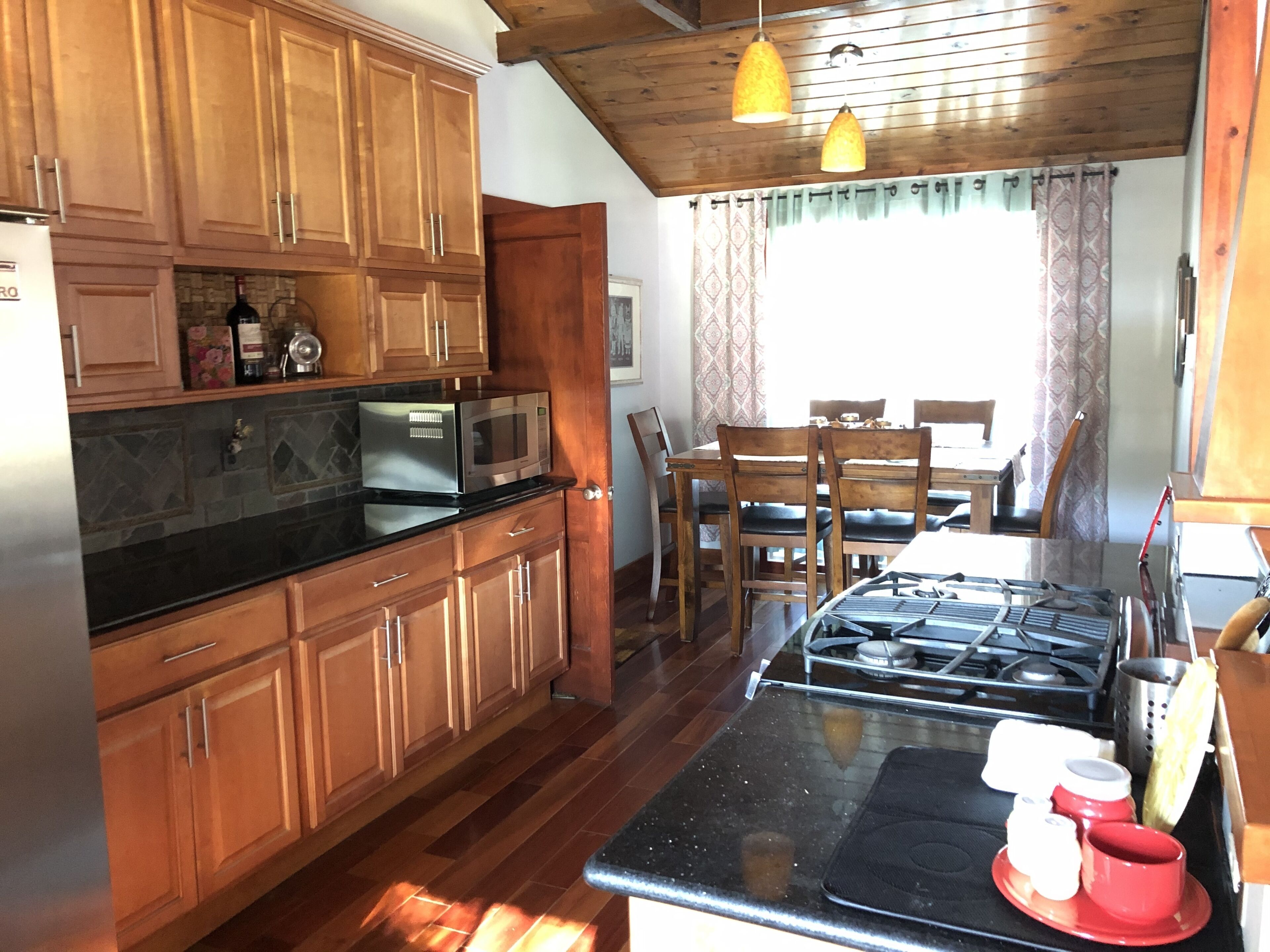 Microwave, dishwasher, coffee/tea maker, cookware/dishes/utensils