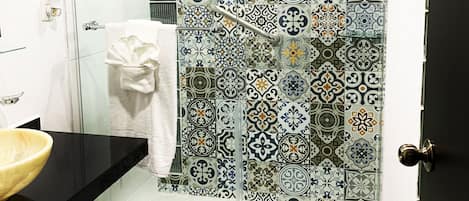 Shower, hair dryer, towels, toilet paper