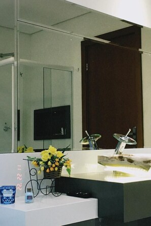 Shower, designer toiletries, hair dryer, bidet