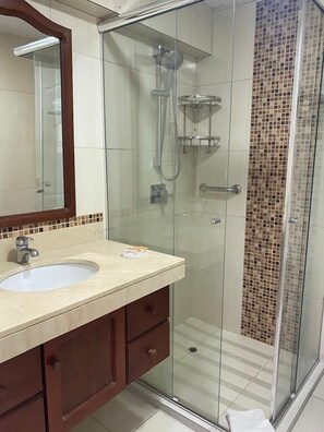 Shower, hair dryer, towels, soap