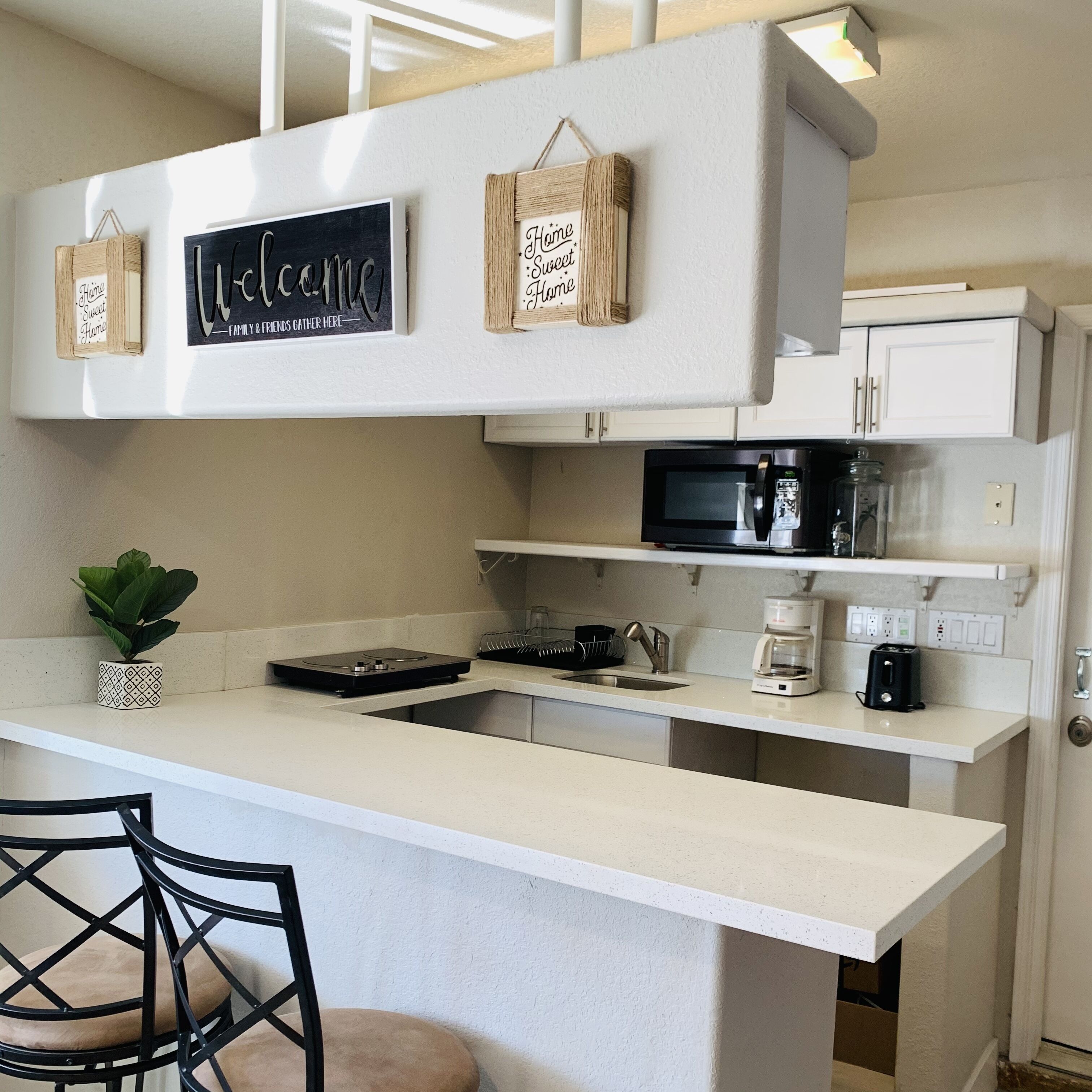 Fridge, microwave, coffee/tea maker, toaster