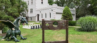 Luxury POCONO CASTLE w/ ESCAPE ROOM, Private Pond, Boats, Sauna & Hot Tub