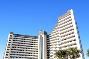 Two high-rise buildings with a clear sky. - SunDestin Resort Unit 0212 (Destin)