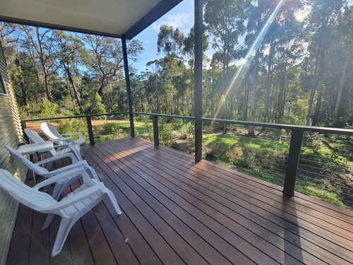 A beautiful chalet in a secluded bush environment, only a short walk to town.