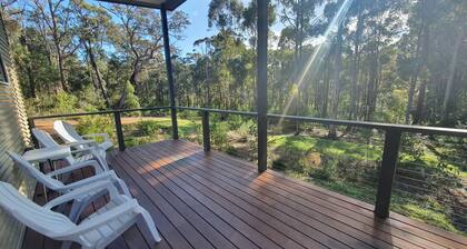 A beautiful chalet in a secluded bush environment, only a short walk to town.