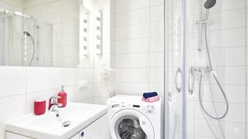 Regadera, regadera tipo lluvia, secadora de cabello, jabón