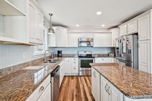 Fridge, microwave, oven, stovetop - Surfs Up, Beautiful 6 BR Ocean Front Home with Private Swimming Pool (North Myrtle Beach)