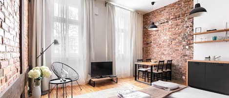 Suite studio Design | Fer et planche à repasser, lit de bébé portatif, accÚs au Wi-Fi (inclus)