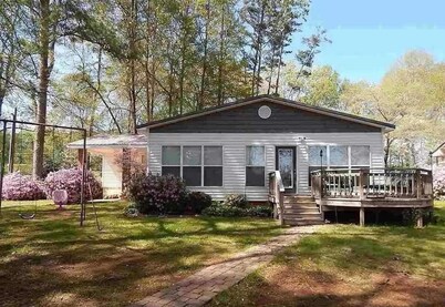 Lakefront home- 3 slip boathouse-Large yard