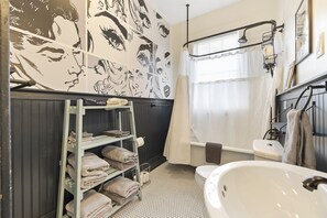 Combined shower/tub, hair dryer, towels, soap