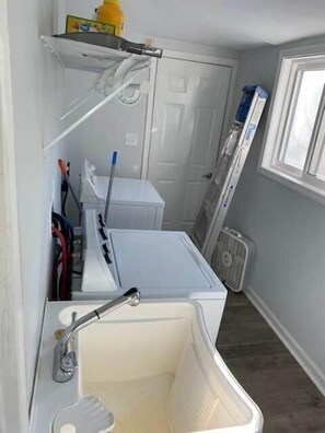 Hair dryer, towels, soap, shampoo