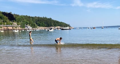 Nestled between Bar Harbor and Acadia, a bright and spacious house in the woods
