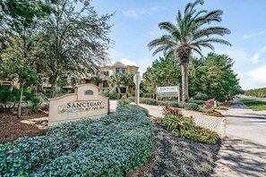Enter a tranquil oasis at Sanctuary by the Sea, surrounded by lush gardens and a striking dome-shaped roof.