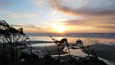 Enjoy the beach, ocean and sunsets no matter the weather.