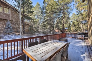 Enjoy dining or socializing on the deck, which offers a grill and comfortable seating.