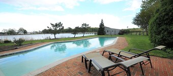 Stunning Waterfront Home, long pier, pool, featured in Conde Nast Traveler