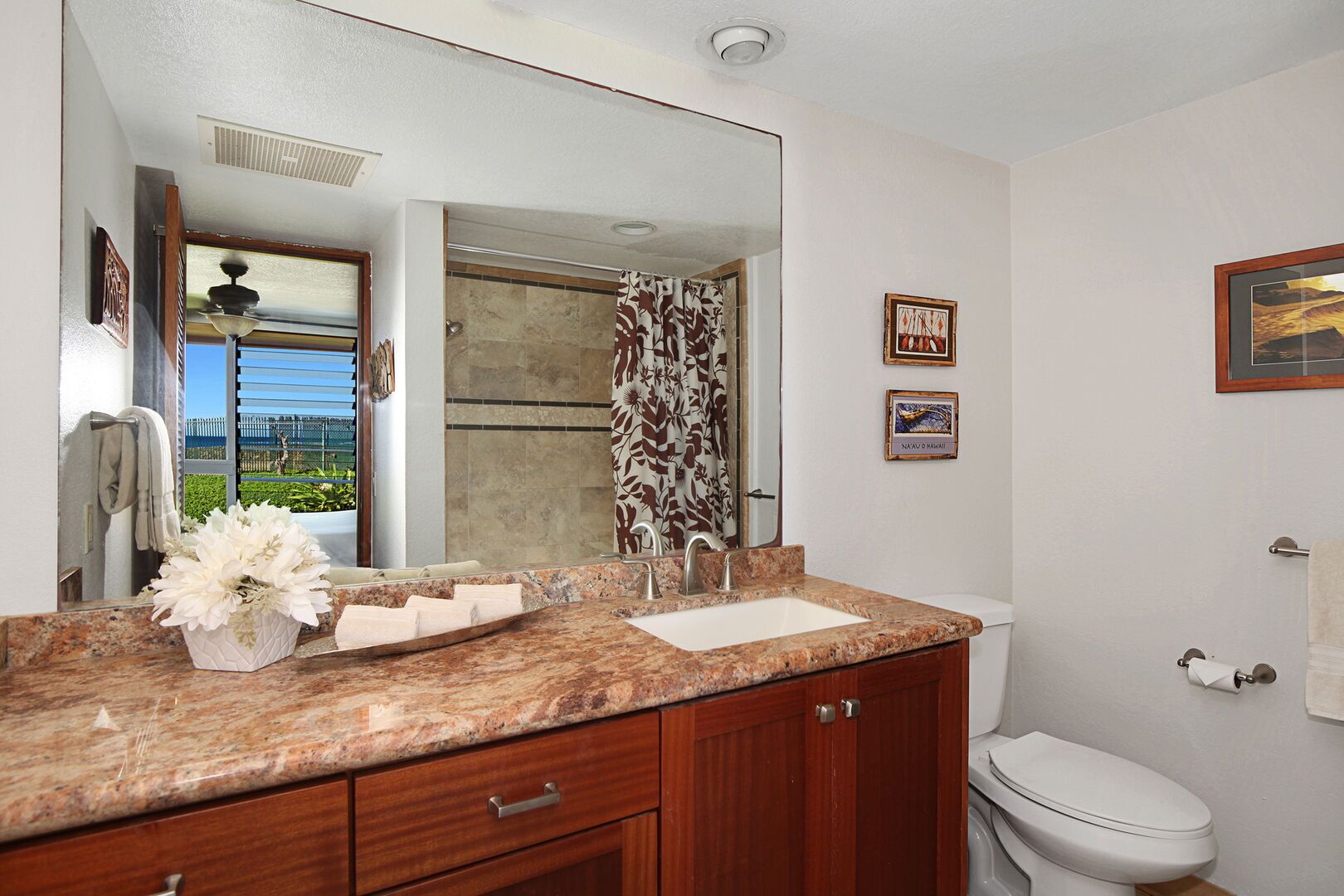 Combined shower/tub, hair dryer, towels, toilet paper