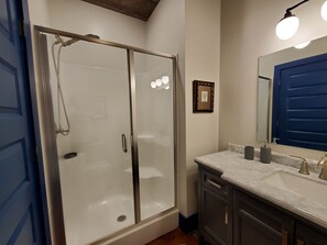 Combined shower/bathtub, hair dryer, towels, soap