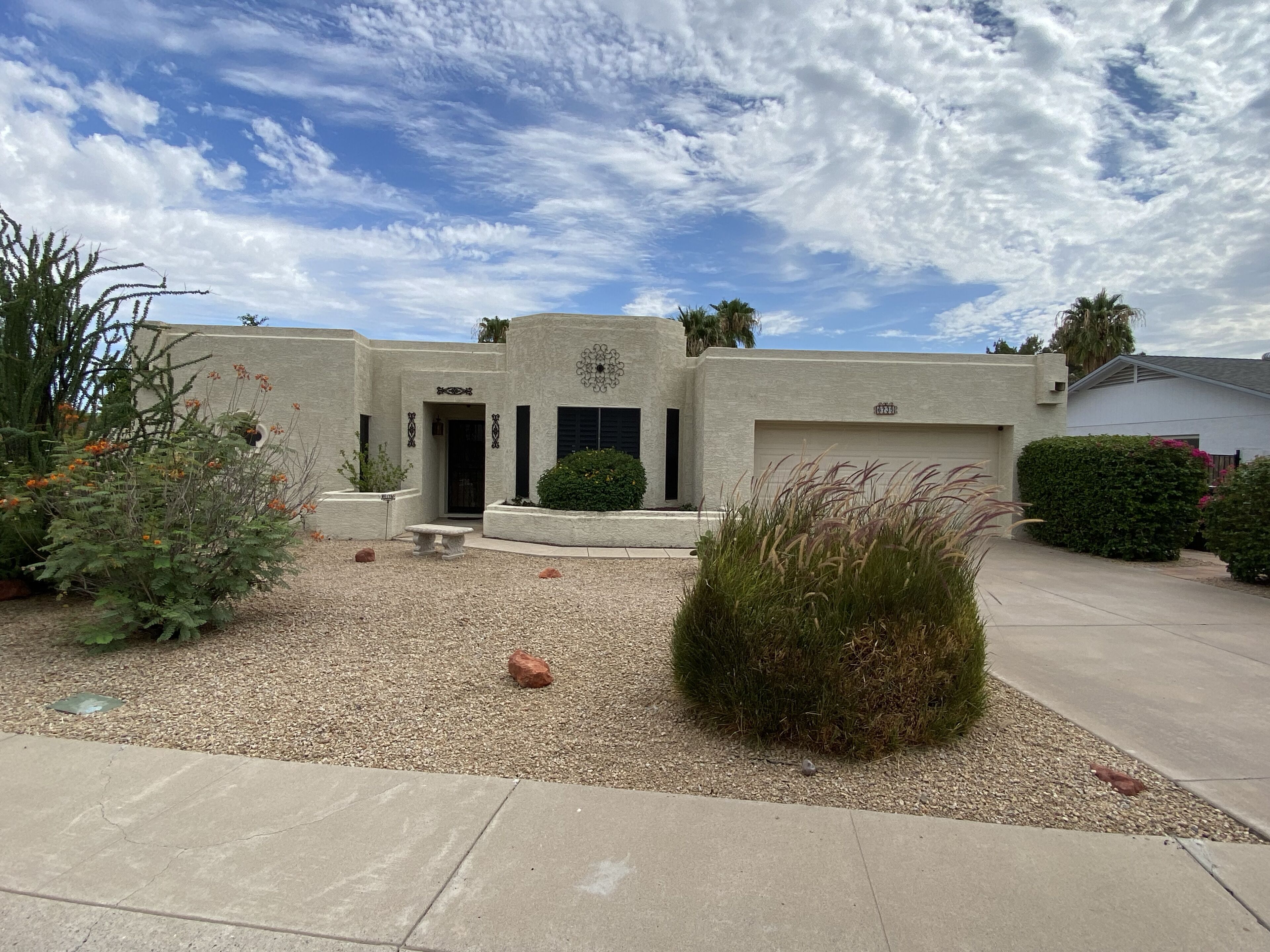 Gorgeous corner lot home with a private pool and hot tub.