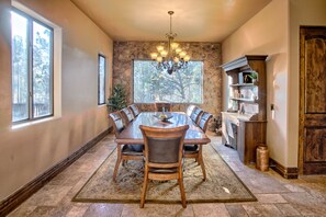Enjoy meals in this dining area with a large table and six comfortable chairs.
