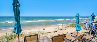 Dog-friendly home with lake views, wood stove, kayaks/SUPs, & W/D