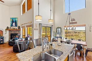 Dining - Rainbow Lake Cabin · Lakefront with Kayaks · Sleeps 10 · Dogs Welcome (Lakeside)