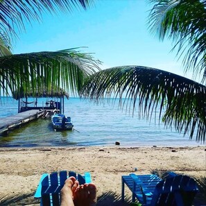 On the beach, sun loungers, beach towels