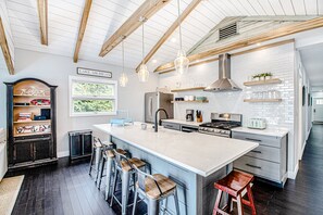 Fridge, microwave, oven, stovetop - Fully-renovated lakefront home with beach cabana, association beach, & firepit (Lakeside)