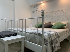 1 habitación, caja de seguridad en la habitación y ropa de cama 