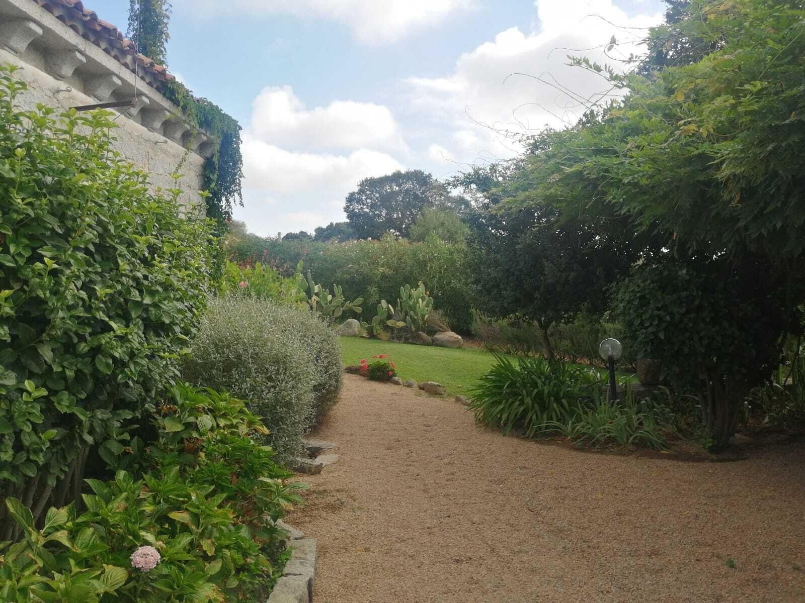 Villa, varias camas | Jardines del alojamiento