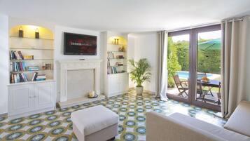 TV, DVD player, ping pong, books