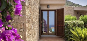 Enter a serene mountain retreat with breathtaking views of the surrounding landscape.