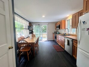 Fridge, microwave, oven, stovetop - Experience the charm of Cape Cod, a spacious 4-bedroom retreat in Eastham (Eastham)