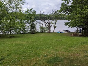 Property grounds - Cozy private cabin on a quiet lake with your own beach. (Elkhorn)